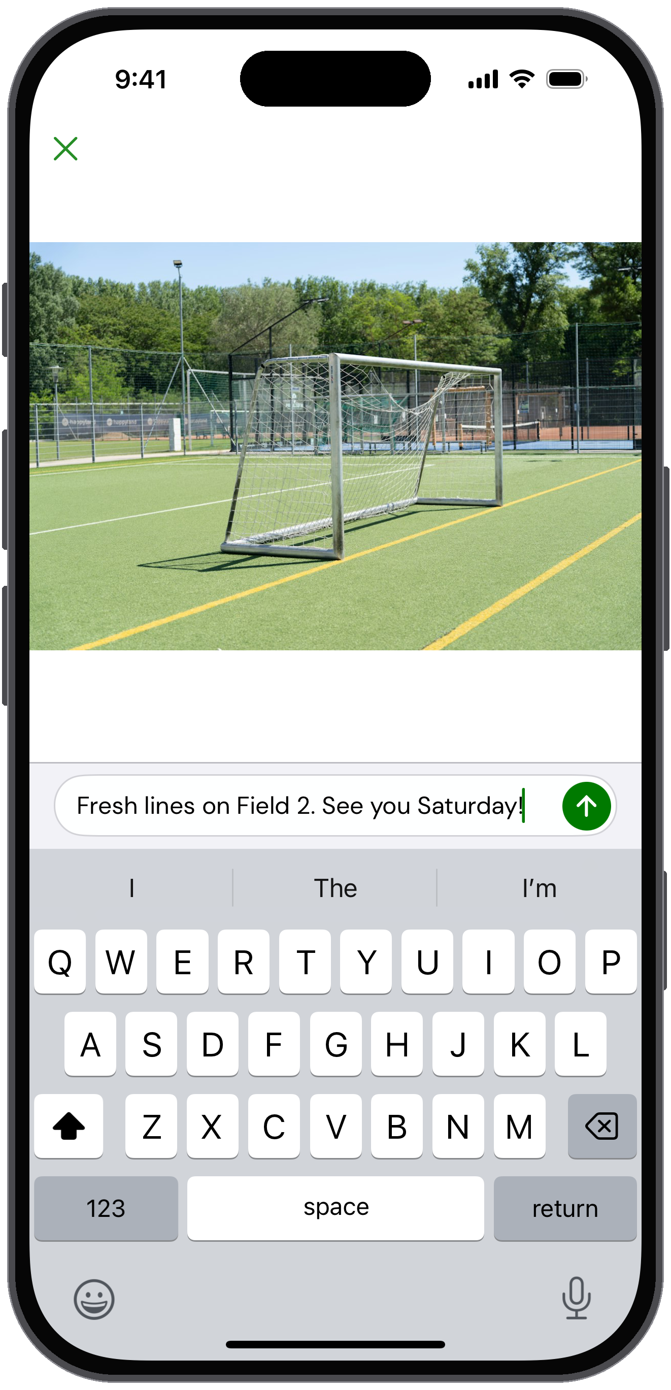 Photo of a soccer field ready to send in chat with a caption being typed